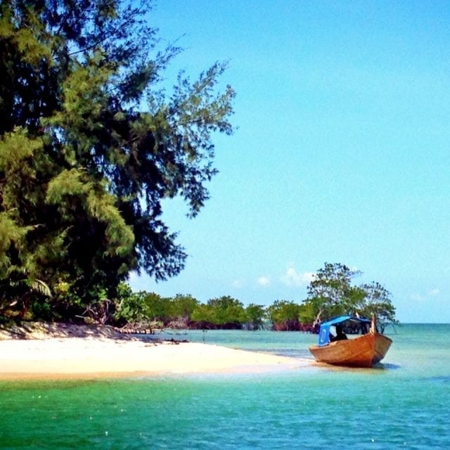 Sail off the Main Island and Visit a Kampung Beach in Pulau Tunjuk